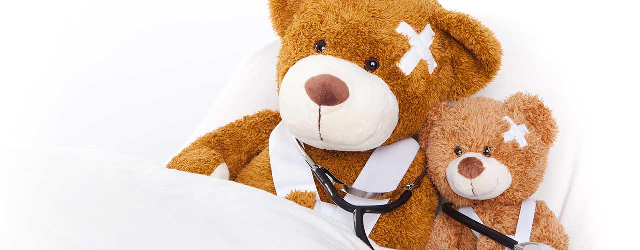 Teddybär als Zeichen für die Reiseversicherung